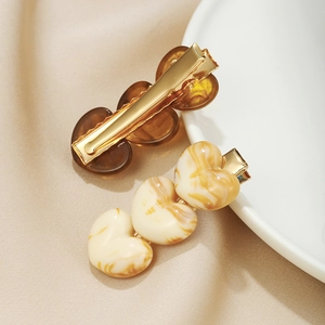 Retro acrylic heart hair clip set with cream marble texture and amber resin finish