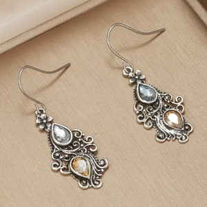 Vintage gun-black drop earrings featuring blue and amber pear-cut crystal gemstones