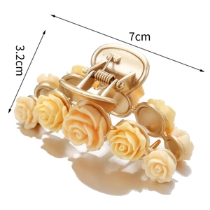 Elegant champagne rose hair claw clip in gold metal with vintage 3D flower design