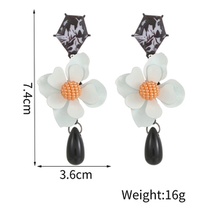 Detailed view of floral drop earrings with size 7.4cm height and 3.6cm width