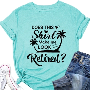 T-shirt en coton bleu avec texte humoristique noir et motifs tropicaux imprimés