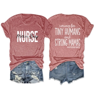 Detailed view of rust-red t-shirt with Caring For Tiny Humans print and denim shorts