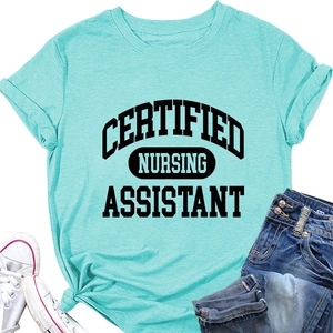 Flat lay of teal Certified Nursing Assistant t-shirt with jeans and sneakers