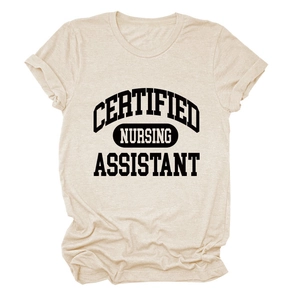 Detail of rolled cuffs and black Certified Nursing Assistant text on a beige T-shirt