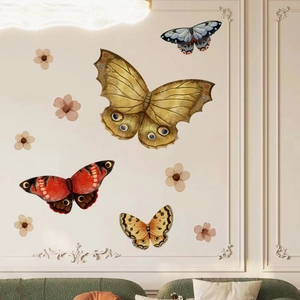 Detail of bohemian butterfly and floral wall stickers in a cozy home interior setting
