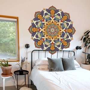 Detail of bohemian lotus mandala wall decal above a bed in a modern bedroom setting