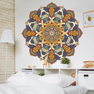 Large mandala wall decal with symmetrical lotus pattern in orange and green for home decor
