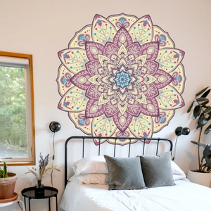 Detailed view of large lotus mandala wall sticker above a bed in a cozy bedroom