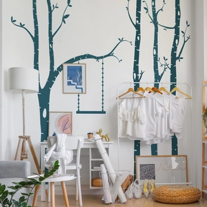 Detailed view of dark blue Nordic forest and swing wall decal in a modern living room