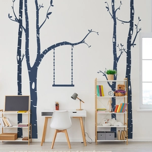 Detailed view of dark blue Nordic style tree wall decals with a swing silhouette