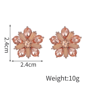 Detail view of rose gold star earrings with champagne crystals measuring 2.4cm