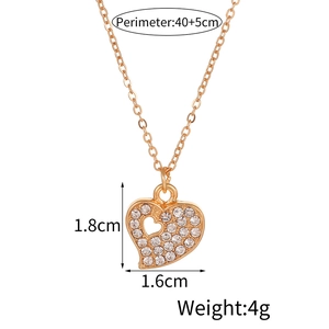 Detail view of heart pendant dimensions 1.8cm by 1.6cm with 40+5cm chain length