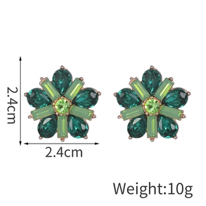 Detail showing green crystal flower earrings with 2.4cm size and 10g weight display