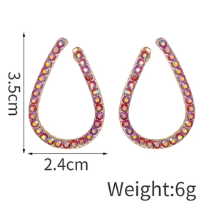 Eleganti orecchini a goccia dorati con strass magenta, dimensioni 3,5 cm per 2,4 cm
