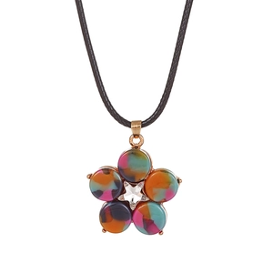 Detail of colorful resin flower pendant with star crystal on black woven cord necklace