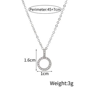 Detail view of silver circle pendant with pave set zircons and 45+7cm chain measurements