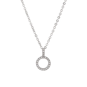 Close-up of sparkling crystal-encrusted round pendant on a fine silver necklace chain