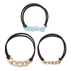 Three-piece hair tie set featuring Klein blue acrylic and gold metal chain links