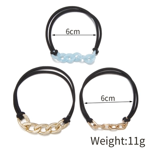 Three-piece hair ties set with Klein blue and gold chain links and black elastic bands