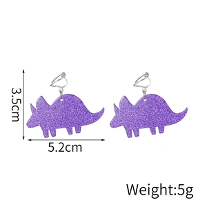 Purple glitter triceratops earrings detail with dimensions 3.5cm height and 5.2cm width