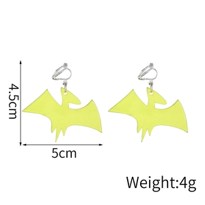 Detailed view of yellow acrylic dragon earrings with 5cm width and 4.5cm height