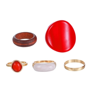 5-piece vintage ring set with natural red stone and resin accents on white background
