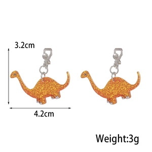 Detail view of glittery orange acrylic dinosaur clip-on earrings with size measurements