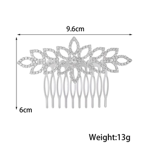 Elegant silver bridal hair comb with rhinestones measuring 9.6cm x 6cm and weighing 13g