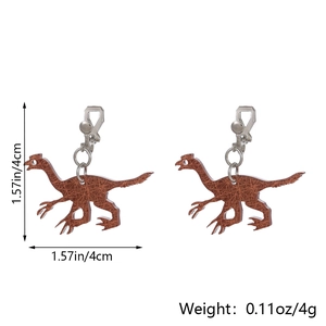 Detailed view of acrylic dinosaur earrings with brown texture showing size and weight specs