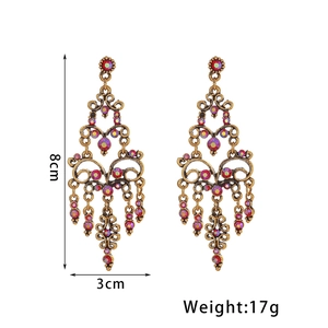 Vintage Boheemse hangoorbellen van legering met paarse strass en holle bloempatronen