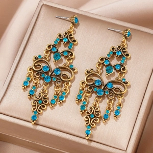 Bohemian vintage goudkleurige kroonluchter oorbellen met turquoise edelstenen