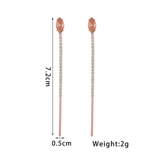 Detail view of long rhinestone tassel flower earrings with 7.2cm length dimensions