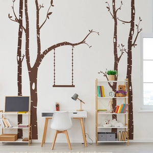 Detailed view of large dark brown birch tree wall decals with a hanging swing for living rooms