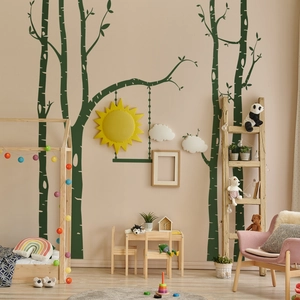 Detailed view of forest wall stickers featuring green trees, yellow sun and white clouds