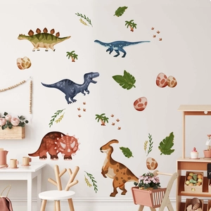 Detailed view of cartoon dinosaur wall decals in a bright, modern nursery playroom