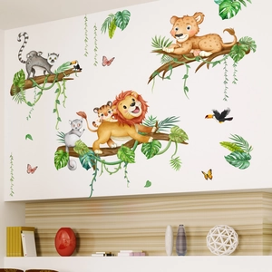 Detail of jungle animals wall stickers with lion and tiger in a kids' room setting