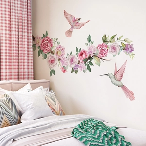 Watercolor pink peony flowers and hummingbird wall decal in a cozy bedroom setting