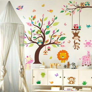 Detailed jungle nursery wall decal with tree, giraffe, lion, and monkey animal stickers