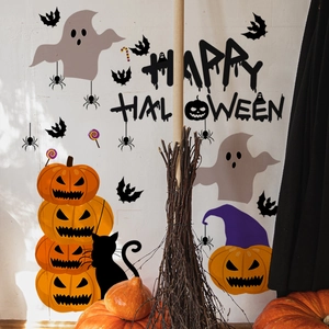 Detail of Halloween wall decals featuring Happy Halloween text, pumpkins and bats