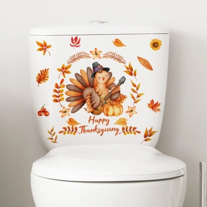 Detail of Happy Thanksgiving toilet sticker featuring a turkey with pumpkin and autumn leaves