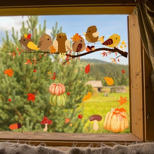 Herbstliche Fensterbilder mit Ahornblättern und Kürbissen auf ländlichem Hintergrund