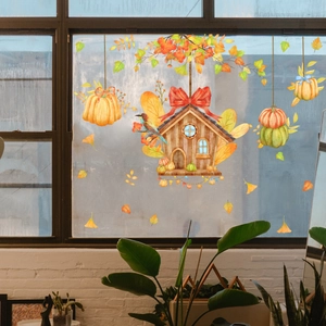 Autumn static window clings featuring watercolor pumpkins, birdhouse and ginkgo leaves