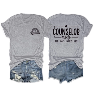 Detail of grey cotton blend t-shirt with rainbow counselor logo and distressed denim shorts