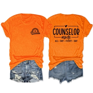Bright orange cotton t-shirt and blue distressed denim shorts with counselor prints