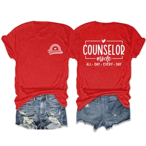 Detail of red Counselor mode T-shirt paired with distressed frayed denim shorts