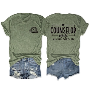 Detailed front and back view of green counselor mode slogan cotton t-shirt and denim shorts