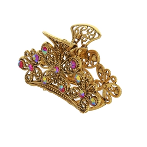 Vintage gold hollow butterfly hair claw clip with colorful rhinestones on white background