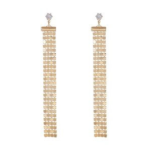 Detail of long gold tassel earrings with sparkling round cubic zirconia stones