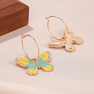 Boucles d'oreilles créoles papillon en émail minimaliste aux couleurs jaune et sarcelle