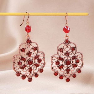 Bohemian vintage drop earrings with red crystals and bronze mandala floral design